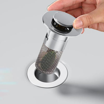 Bouchon de vidange pop-up avec filtre intégré