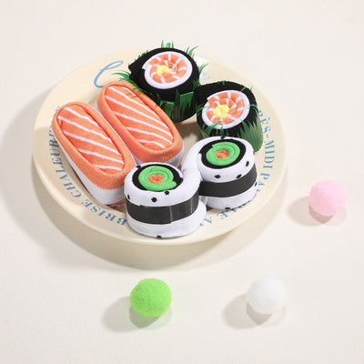 Chaussettes sushi Velora Makisu dans leur boîte à emporter